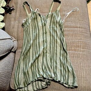 Sage green pattern with white romper that buttons all the way down